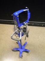 GE DINAMAP CARESCAPE V100 PATIENT MONITOR ON ROLLING STAND