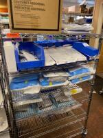 CART AND CONTENTS TO INCLUDE: ABDOMINAL PADS AND CATHETERIZATION KITS LOCATION: 2 CAF.