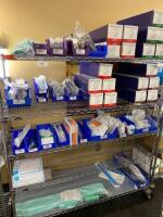 CART AND CONTENTS TO INCLUDE: SURGICAL SCRUB BRUSHES AND TUBING LOCATION: 2 CAF.