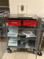 CART AND CONTENTS TO INCLUDE EPIDURAL ANESTHESIA TRAYS AND SPINAL TRAYS LOCATION: 1N