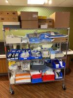 CART AND CONTENTS TO INCLUDE: PACKING STRIPS, IV CATHETERS, AND DRAPES LOCATION: 2 CAF.