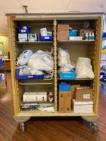 CART AND CONTENTS TO INCLUDE: SURGICAL GLOVES, SPONGES, AND SURGICAL SCRUB LOCATION: 2 CAF.