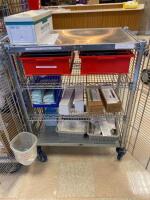 CART AND CONTENTS TO INCLUDE: SURGICAL PADS AND IRRIGATION NEEDLES LOCATION: 2 CAF.