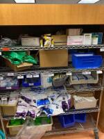 CART AND CONTENTS TO INCLUDE: CERVICAL COLLARS, TINCTURE SWABSTICKS, AND ASSORTED KNIT PANTS LOCATION: 2 CAF.