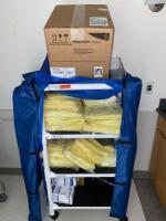 CART AND CONTENTS TO INCLUDE: ASSORTED MEDRAD STERILE DISPOSABLE SYRINGS AND PROCEDURE GOWNS LOCATION: CCC HW