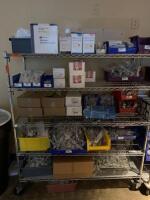 CART AND CONTENTS TO INCLUDE: ASSORTED SYRINGES, NEEDLES AND STABILIZER KITS, AND SODIUM CLORIDE INJECTIONS LOCATION: 2 CAF.