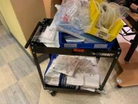 CART AND CONTENTS INCLUDING: CV CATHETERS, ADULT RESUSCITATOR, AND PRESSURE MONITORING SETS LOCATION: 2 CAF.