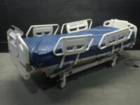 HILL-ROM ADVANTA P1600 HOSPITAL BED WITH HEAD AND FOOT BOARDS