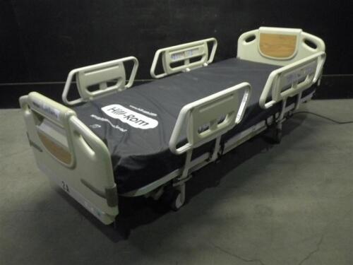 HILL-ROM P1600 ADVANTA HOSPITAL BED WITH HEAD AND FOOT BOARDS