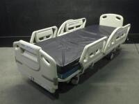 HILL-ROM P1600 ADVANTA HOSPITAL BED WITH CPR AND FOOT BOARD