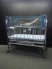 HARD INFANT CRIB