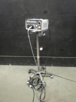 LUXTEC SS1300A LIGHT SOURCE WITH HEAD LAMP ON ROLLING STAND