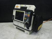 MEDTRONIC/PHYSIO-CONTROL LIFEPAK 12 BIPHASIC DEFIB WITH 3 LEAD ECG, PACER, ANALYZE, ECG, SPO2, NIBP, 2 BATTERIES, AC POWER ADAPTER