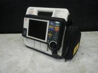MEDTRONIC LIFEPAK 12 BIPHASIC DEFIB WITH 3 LEAD ECG, PACER, ANALYZE, ECG, SPO2, NIBP, 2 BATTERIES