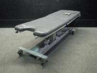 MEDICAL POSITIONING INC. POWER TREATMENT TABLE WITH HAND CONTROL