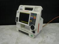 MEDTRONIC/PHYSIO-CONTROL LIFEPAK 12 BIPHASIC DEFIB WITH 12 LEAD ECG, PACER, ANALYZE, ECG, 2 BATTERIES, AC POWER ADAPTER