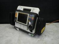 MEDTRONIC LIFEPAK 12 BIPHASIC DEFIB WITH 3 LEAD ECG, PACER, ANALYZE, ECG, SPO2, NIBP, 2 BATTERIES, AC POWER ADAPTER