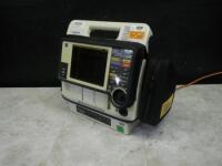 MEDTRONIC LIFEPAK 12 BIPHASIC DEFIB WITH 3 LEAD ECG, PACER, ANALYZE, ECG, SPO2, NIBP, 2 BATTERIES, AC POWER ADAPTER
