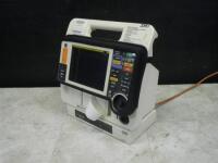 MEDTRONIC/PHYSIO-CONTROL LIFEPAK 12 BIPHASIC DEFIB WITH 3 LEAD ECG, PACER, ANALYZE, ECG, SPO2, NIBP, 2 BATTERIES, AC POWER ADAPTER