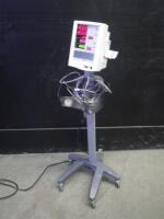 DATASCOPE ACCUTORR PLUS PATIENT MONITOR WITH BP CABLE ON ROLLING STAND