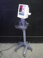 DATASCOPE ACCUTORR PLUS PATIENT MONITOR WITH BP CABLE ON ROLLING STAND