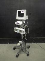 RAD-87/M1204A MONITORING SYSTEM TO INCLUDE: V24C PATIENT MONITOR, RAD-87 PULSE OX, MODULE RACK ON ROLLING STAND