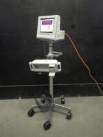 PHILIPS M1204A PATIENT MONITOR WITH MODULE RACK ON ROLLING STAND