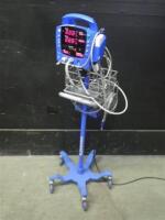 GE DINAMAP PROCARE VITAL SIGNS MONITOR WITH CABLES (SPO2, BP) ON ROLLING STAND