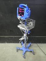 GE DINAMAP PROCARE VITAL SIGNS MONITOR WITH CABLES (SPO2, BP) ON ROLLING STAND