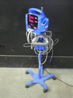 GE DINAMAP PROCARE VITAL SIGNS MONITOR WITH CABLES (SPO2, BP) ON ROLLING STAND