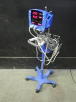 GE DINAMAP V100 CARESCAPE VITAL SIGNS MONITOR WITH CABLES (SPO2, BP) ON ROLLING STAND