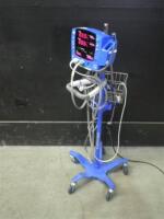 GE DINAMAP V100 CARESCAPE VITAL SIGNS MONITOR WITH CABLES (SPO2, BP) ON ROLLING STAND