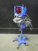 GE DINAMAP V100 CARESCAPE VITAL SIGNS MONITOR WITH CABLES (SPO2, BP) ON ROLLING STAND