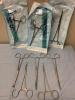 LOT OF 8 CURVED KELLY CLAMPS