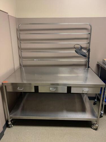 PEDIGO ROLLING STAINLESS WORK TABLE WITH 3 DRAWERS AND MAGNIFYING LIGHT