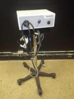 SUNOPTICS SURGICAL SOLARMAXX 300 LIGHT SOURCE WITH HEADSET ON ROLLING STAND