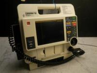 MEDTRONIC/PHYSIO-CONTROL LIFEPAK 12 BIPHASIC DEFIB WITH PACING, 3 LEAD ECG, ANALYZE, PADDLES, BATTERY