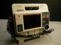 MEDTRONIC/PHYSIO-CONTROL LIFEPAK 12 BIPHASIC DEFIB WITH 3 LEAD ECG, NIBP, ANALYZE, PADDLES