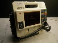 MEDTRONIC/PHYSIO-CONTROL LIFEPAK 12 BIPHASIC DEFIB WITH PACING, 3 LEAD ECG, ANALYZE, PADDLES