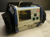 ZOLL M-SERIES BIPHASIC DEFIB WITH PACING, 12 LEAD ECG, CO2, SPO2, NIBP, ANALYZE ((DAMAGED))