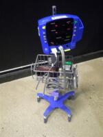 GE DINAMAP CARESCAPE V100 PATIENT MONITOR ON ROLLING STAND