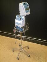 CRITIKON COMPACT T & TS PATIENT MONITORS ON ROLLING STAND