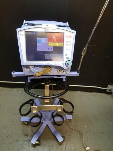 CAREFUSION VELA VENTILATOR ON ROLLING STAND LOCATED IN CHICAGO WAREHOUSE