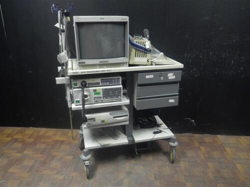 OLYMPUS ENDO CART WITH MONITOR, CV-140 CAMERA CONSOLE WITH PIGTAIL, CLV-U40 LIGHT SOURCE, VIDEO PRINTER, SUCTION PUMP, AND KEYBOARD