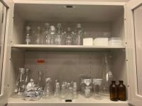 LOT OF ASSORTED GLASSWARE IN CABINET