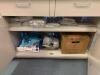 CONTENTS OF BOTTOM CABINETS AND DRAWERS TO INCLUDE: PIPETTES, ASSORTED CANNISTERS AND DISTILLED WATER