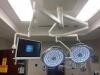 DENTIS L200 LUVIS TRIPLE ARM CENTER MOUNT (2) L200 LED SURGICAL LIGHT AND STRYKER VISIONPRO SYNK WIRELESS 26" LED DISPLAY, MFG. 2018 (OR 2)