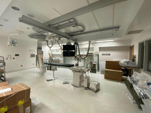 2004 Philips Angio Diagnost 5 Single Plane Cath Lab Xray Tube MRC 200 Ceiling Mounted Gantry Four Monitor Boom w Monitors Patient Table w Patient Side Controls System Console with Monitors Mac Lab  (status unknown) Skytron Stellar Surgical Light with Con