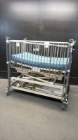 HARD ELECTRIC INFANT CRIB