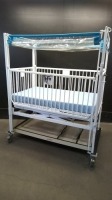 HARD INFANT CRIB